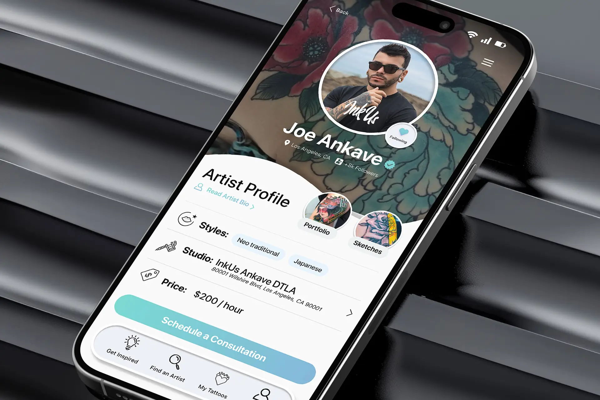 A cellphone screen showing InkUs app screen of the tattoo artist profile.