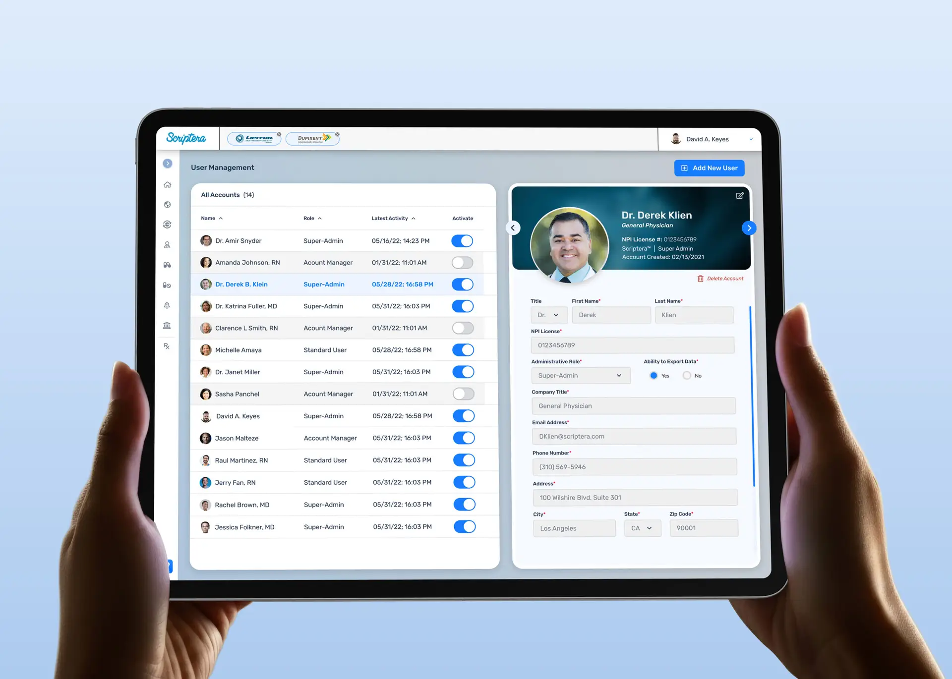 Hands holding tablet showing Scriptera screen